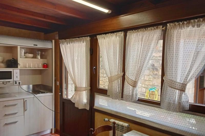 Hotel Arenas De Cabrales- Apartamentos ภายนอก รูปภาพ